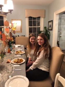 Vanessa and her friend Franzi are sitting at the table, waiting for first ever Thanksgiving dinner in the USA to start.