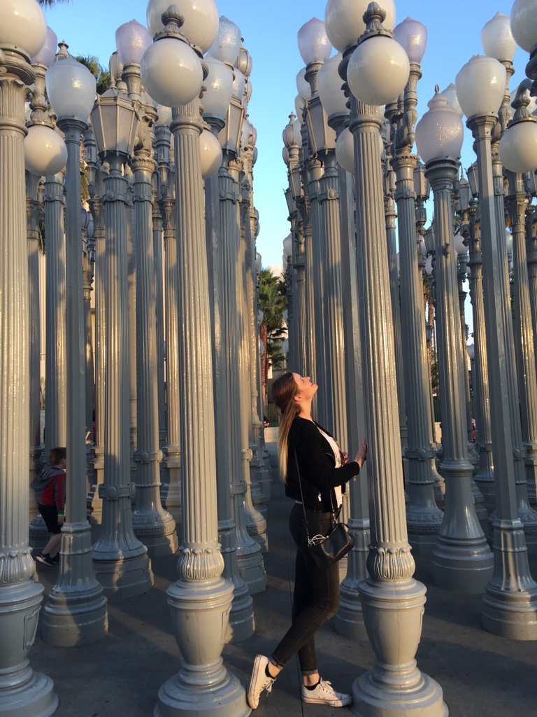 Vanessa taking a pictures with the LACMA Museum lanterns