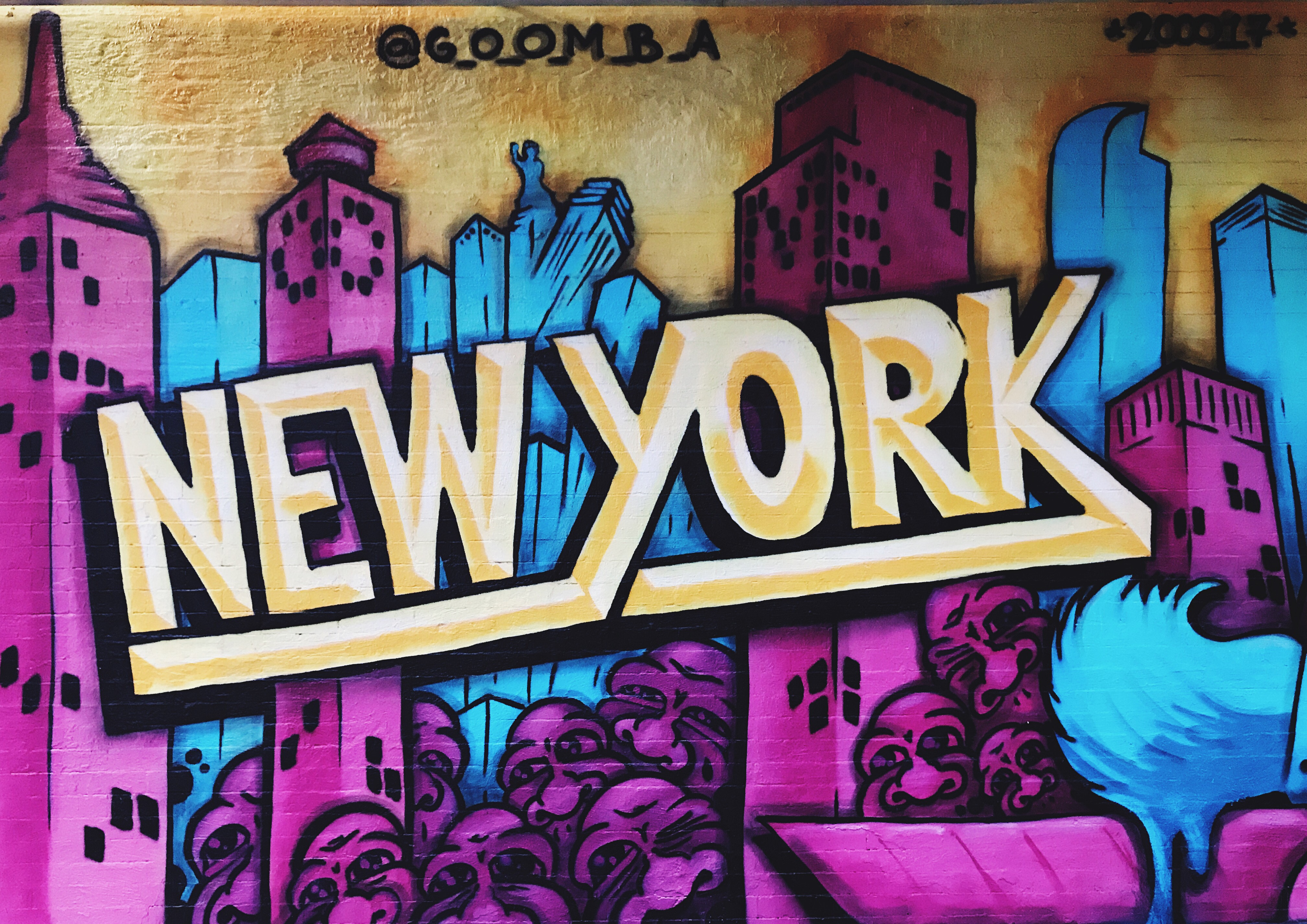 Street graffiti that says "New York"