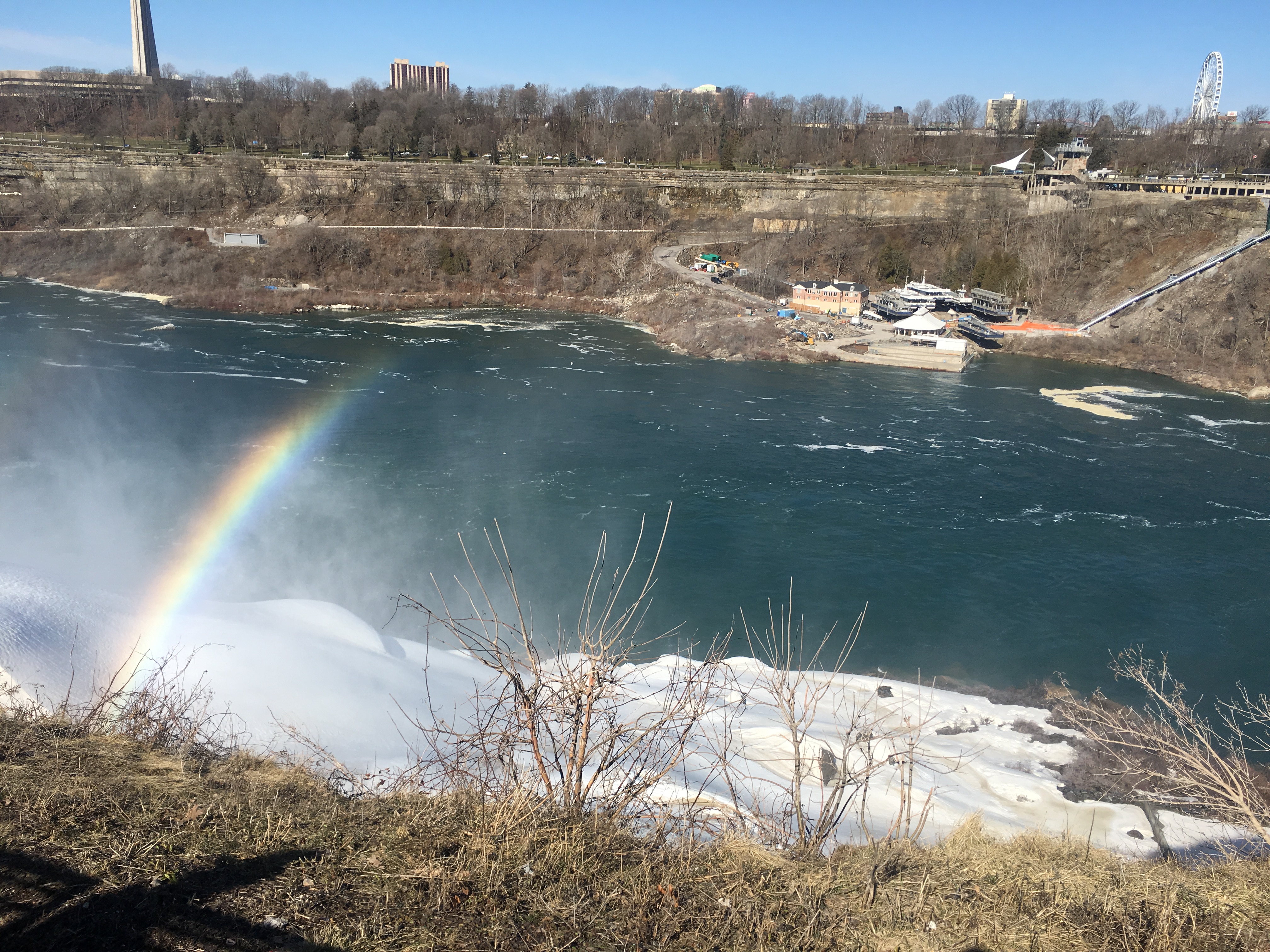 The Niagara Falls with a rainbow overarching it.